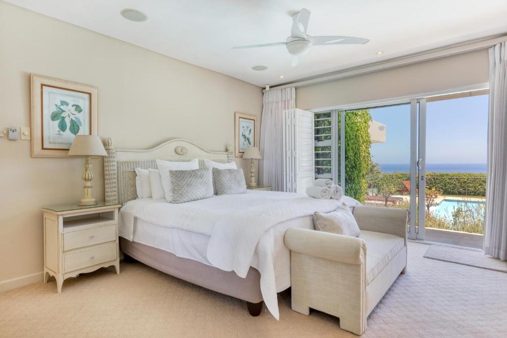 Master bedroom with pool and ocean views
