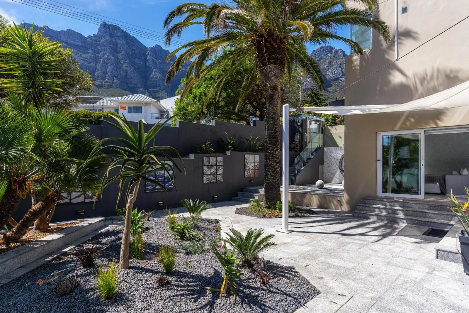 Palm garden with the Twelve Apostles rising behind