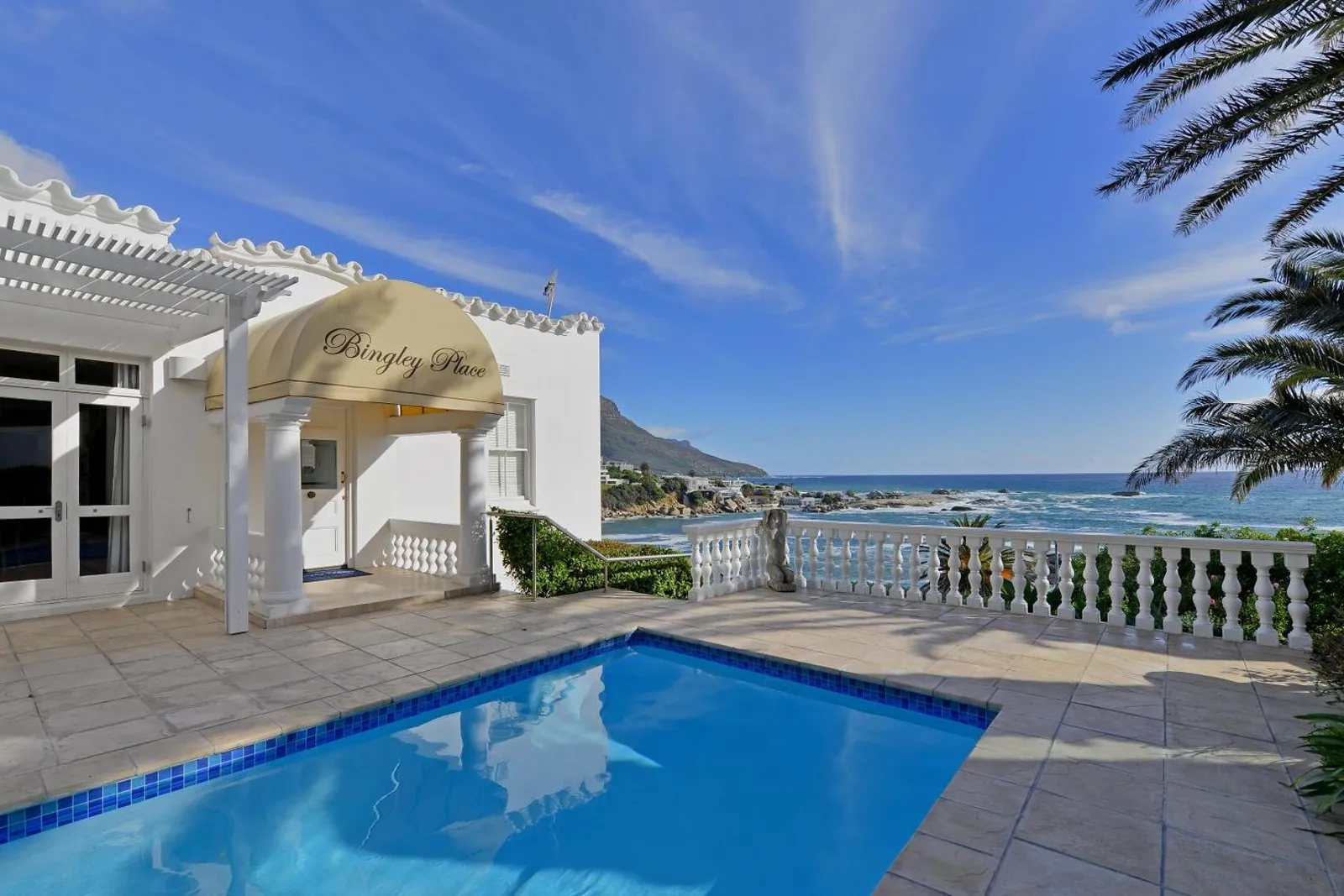 Pool terrace with the Twelve Apostles and the Atlantic beyond