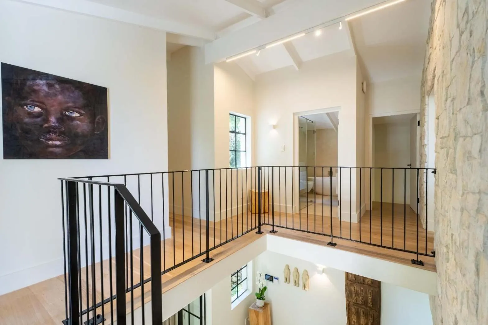 Mezzanine landing overlooking the living room below
