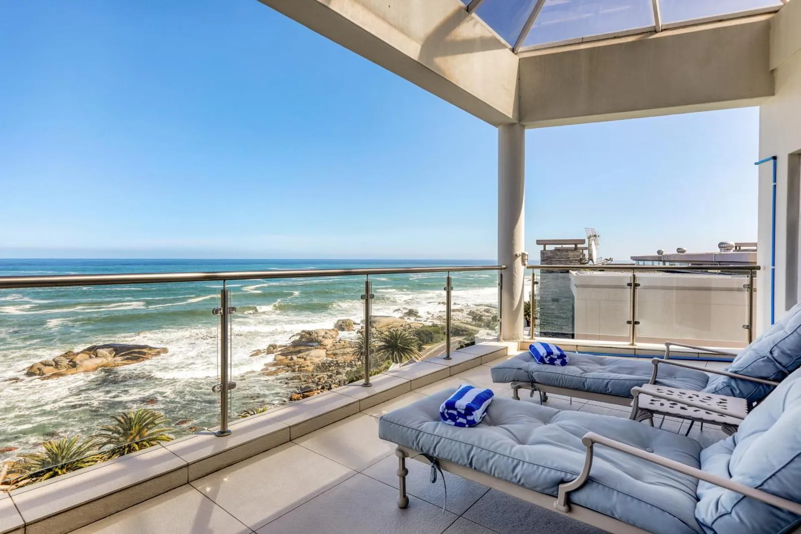 Balcony loungers set above the sea