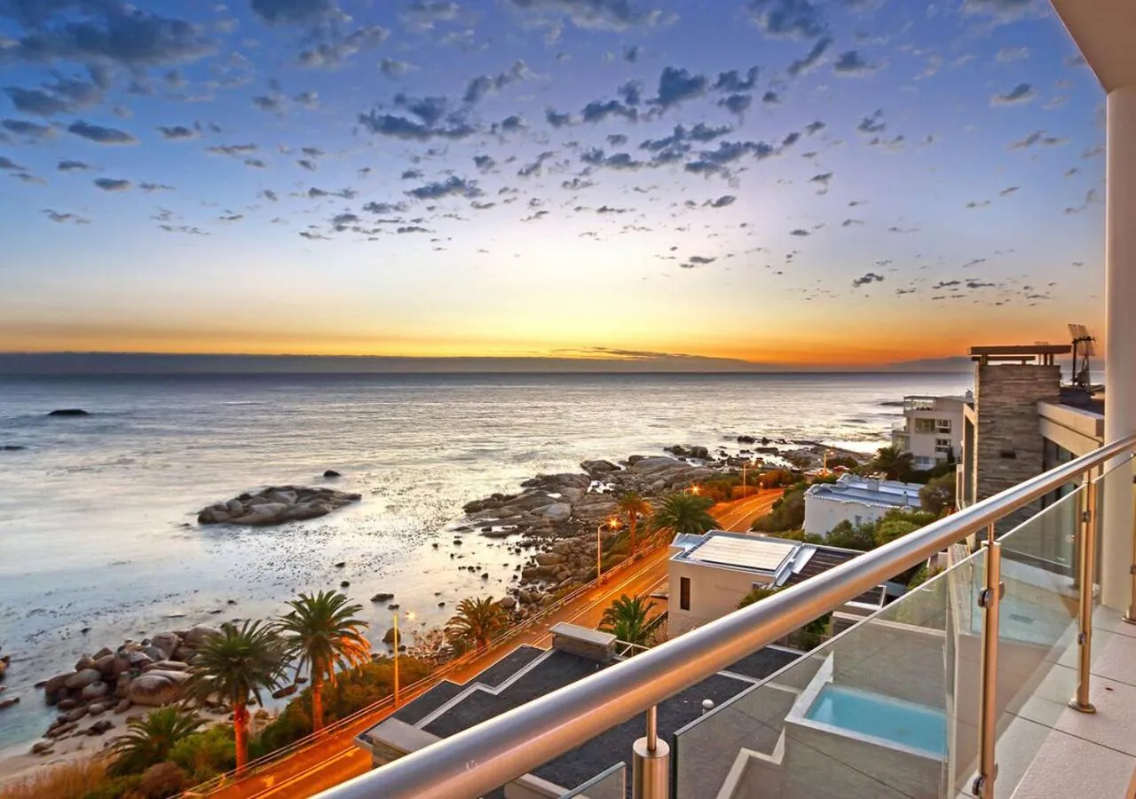 Sunset over the Camps Bay coastline from the balcony