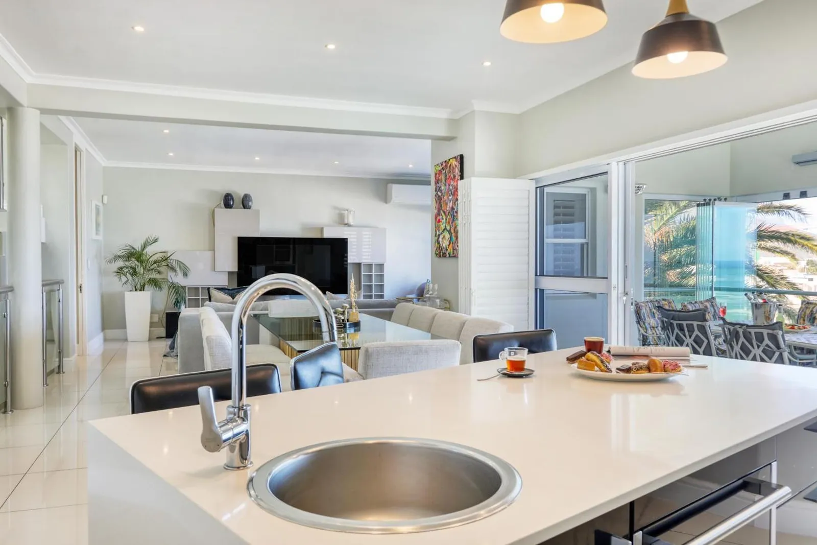 Kitchen island with the living area beyond