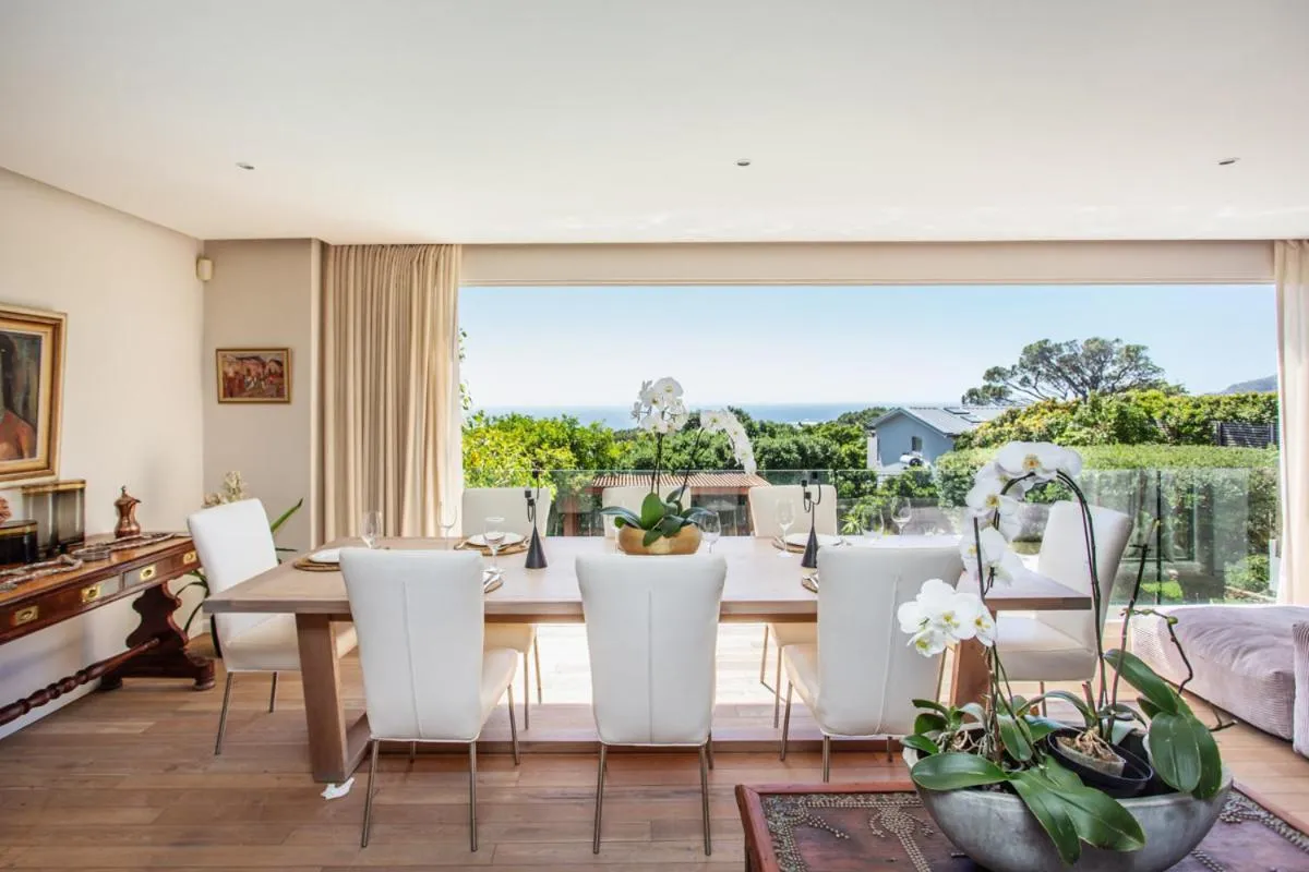 Dining room with the sea through the wide window