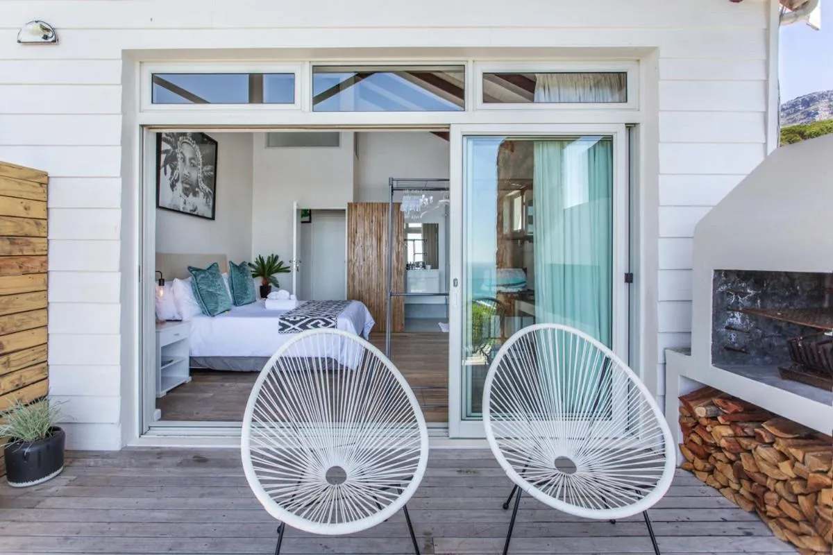 Bedroom opening onto the deck through sliding doors
