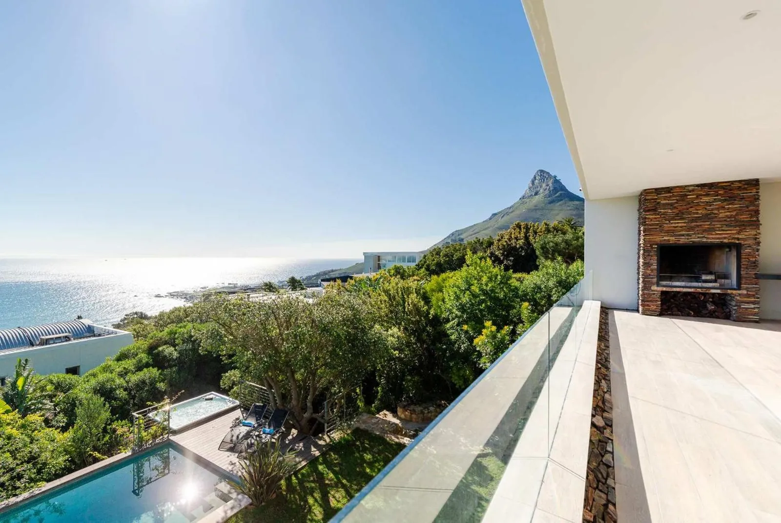 Upper terrace above the pool looking to Lion's Head and the sea