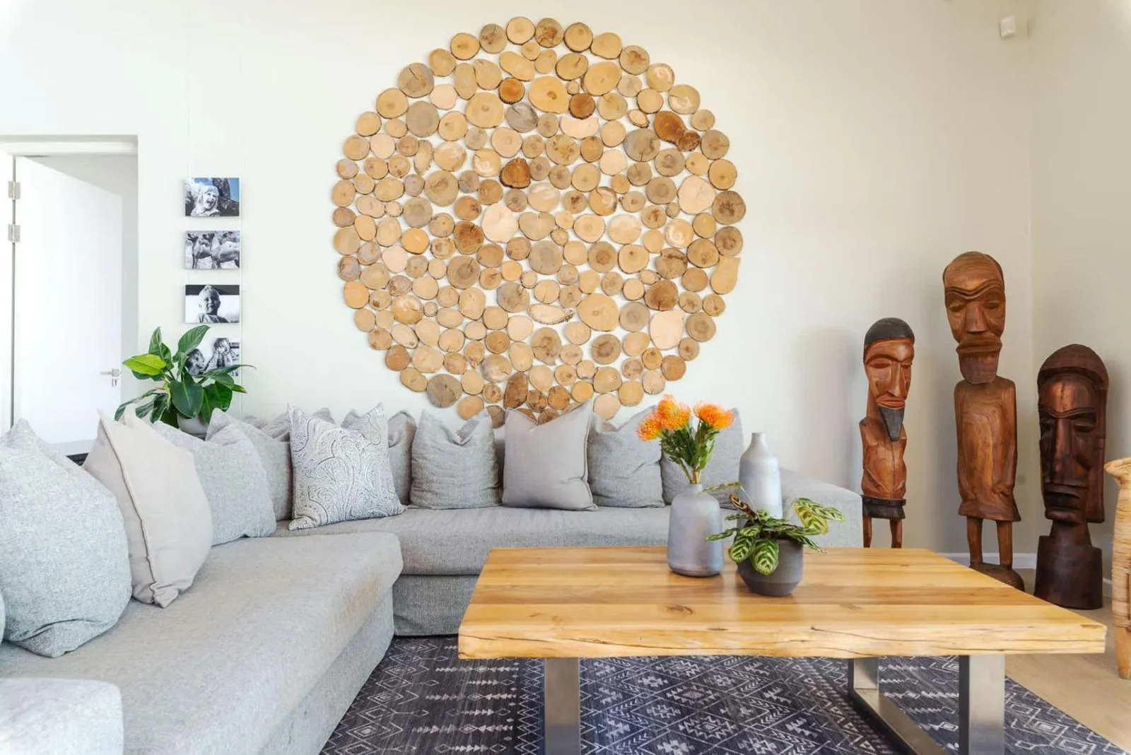 Lounge with sculptural wall art and modular seating