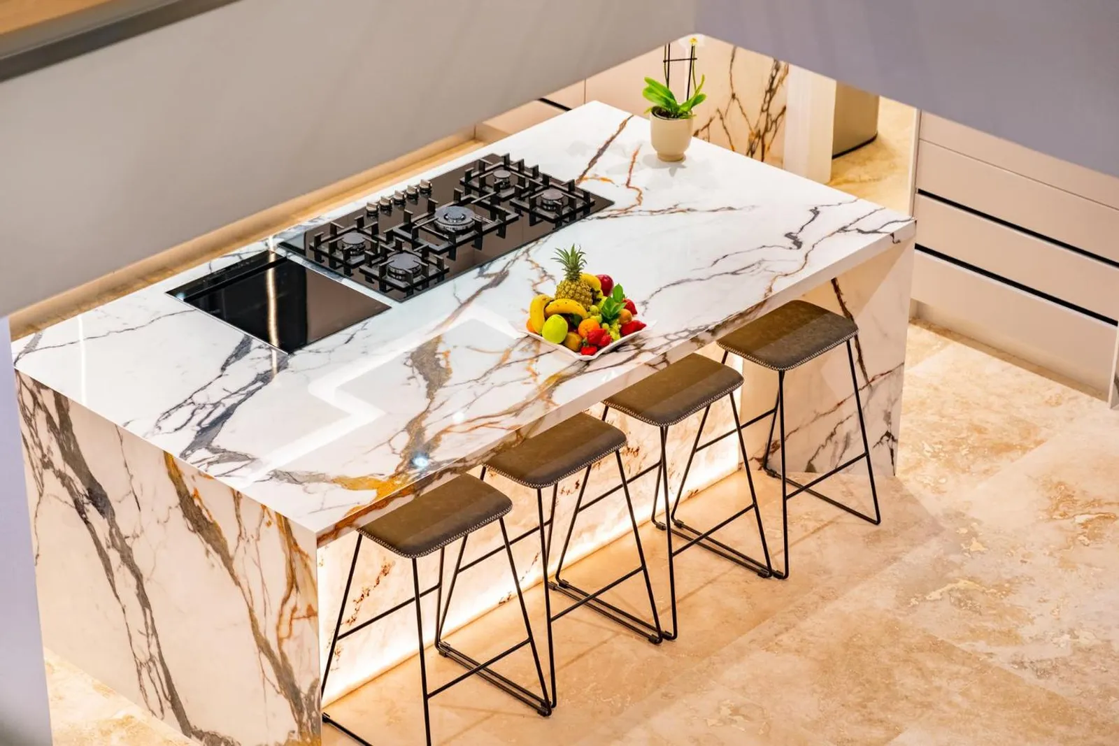 Marble kitchen island with bar stools