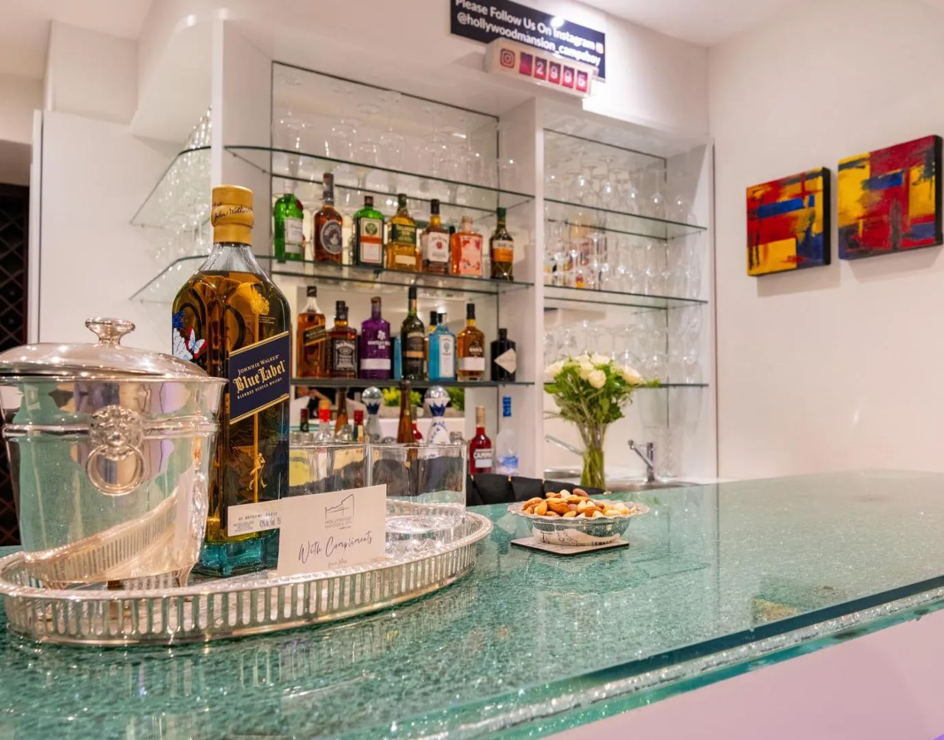 Cocktail bar with backlit shelving