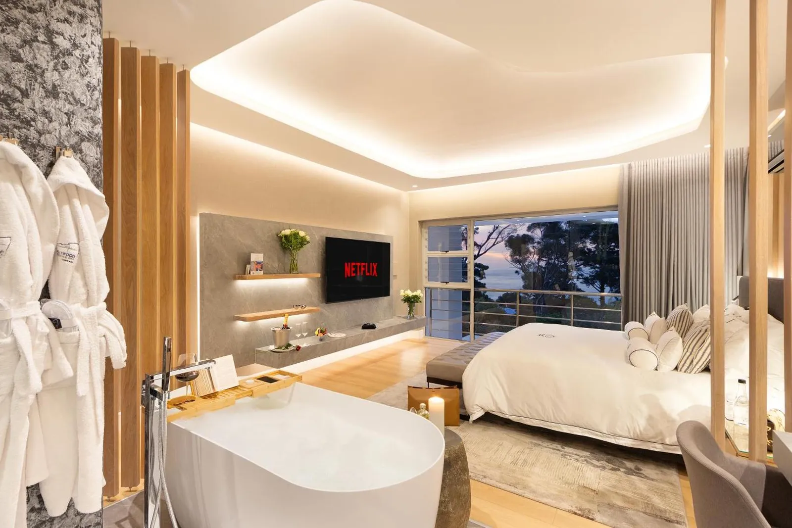 Main suite with a freestanding bath beside the bed