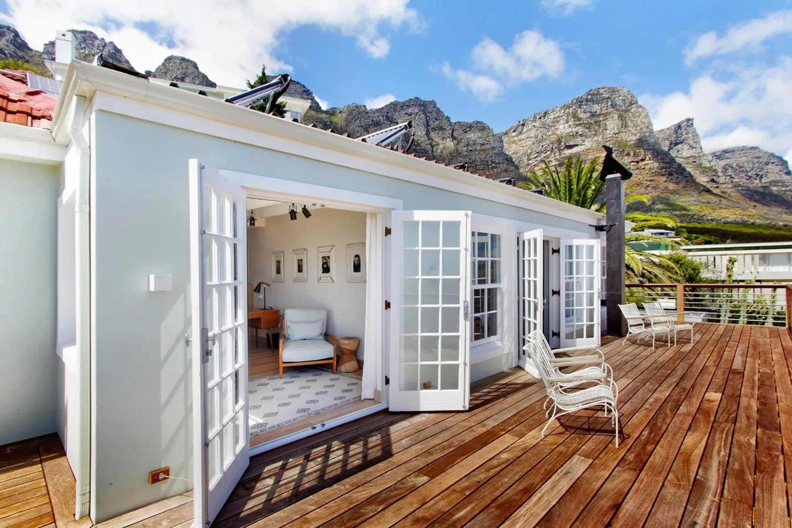 Timber deck and French doors with the Twelve Apostles behind