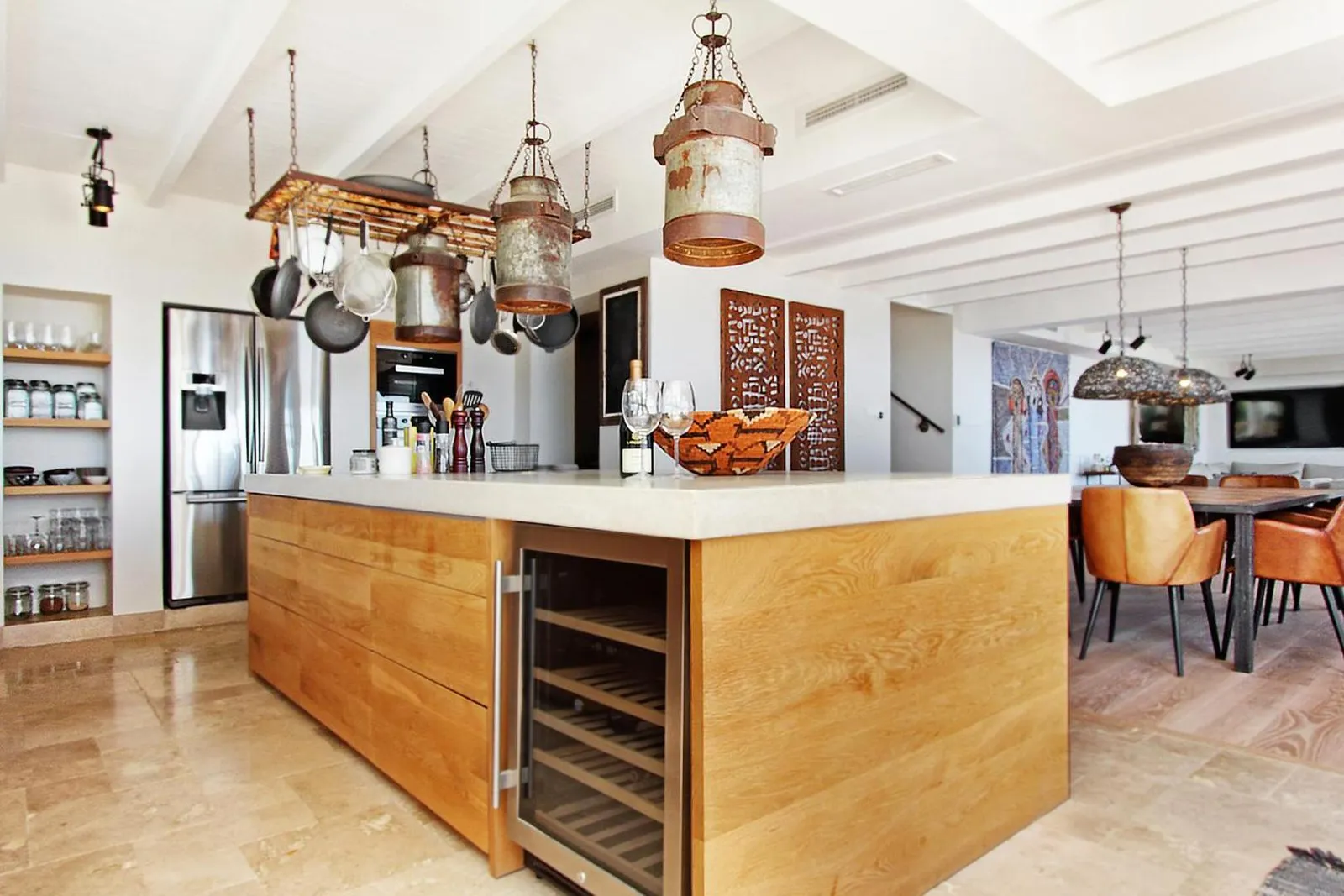 Kitchen island with copper pendant lights