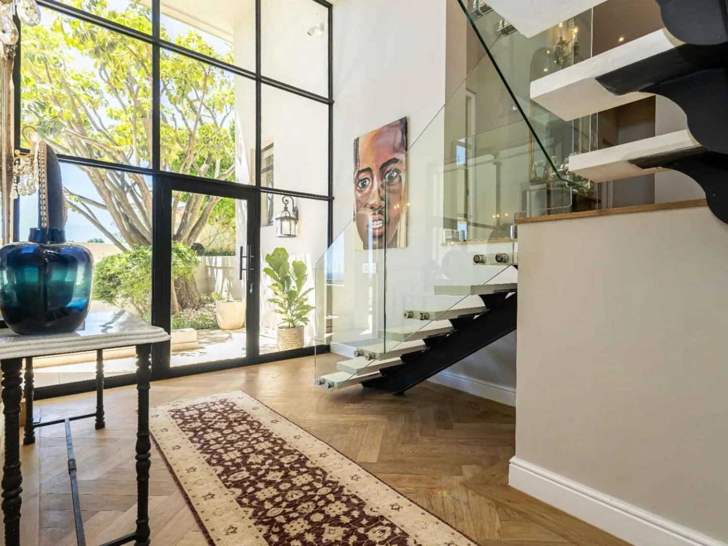 Entrance hall with a floating staircase