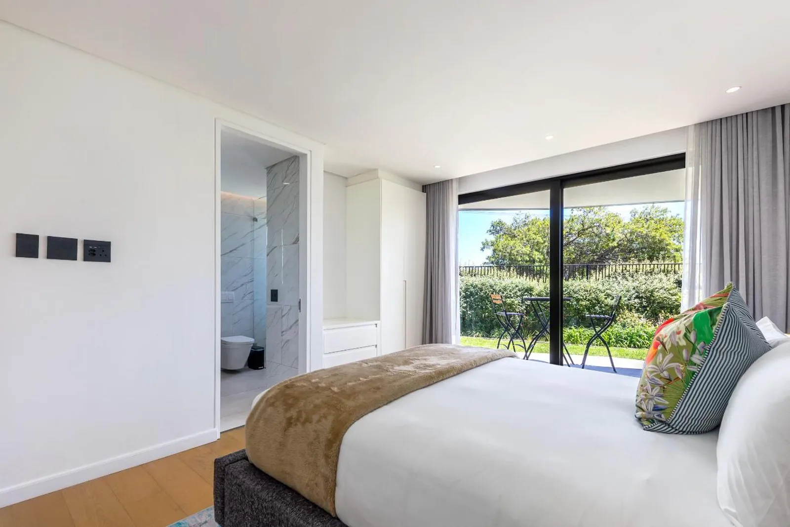 Main bedroom with an en-suite and garden doors