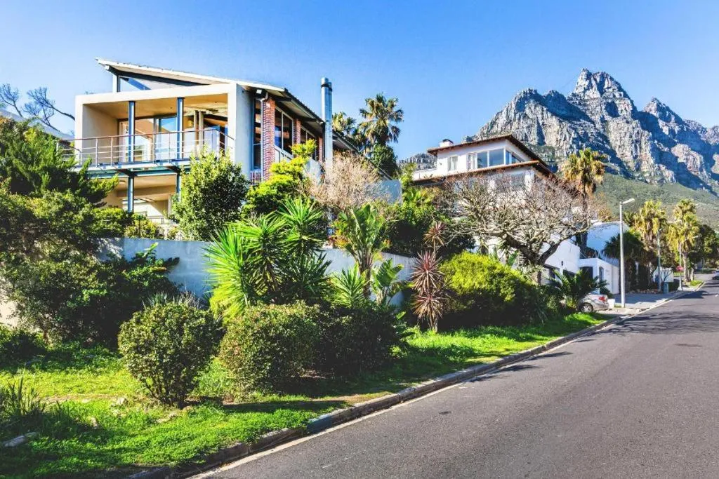 Villa exterior with the Twelve Apostles behind the garden