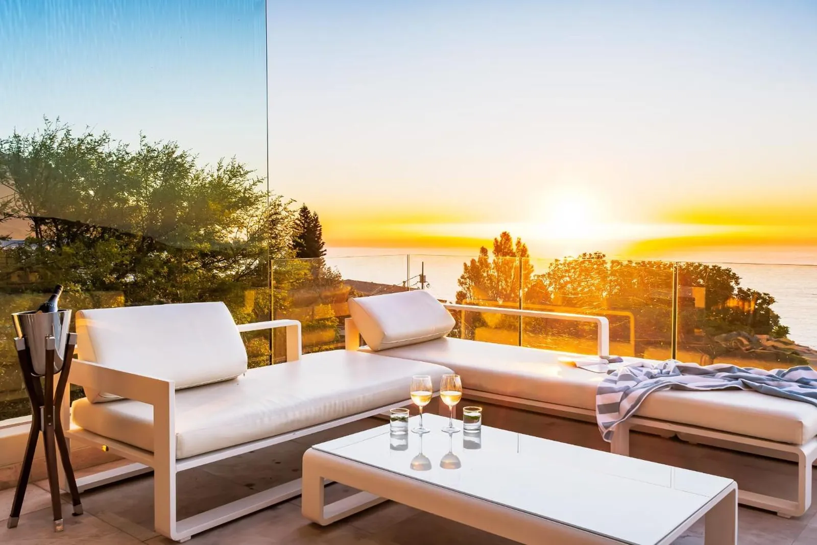 Terrace lounge at sunset above the Atlantic