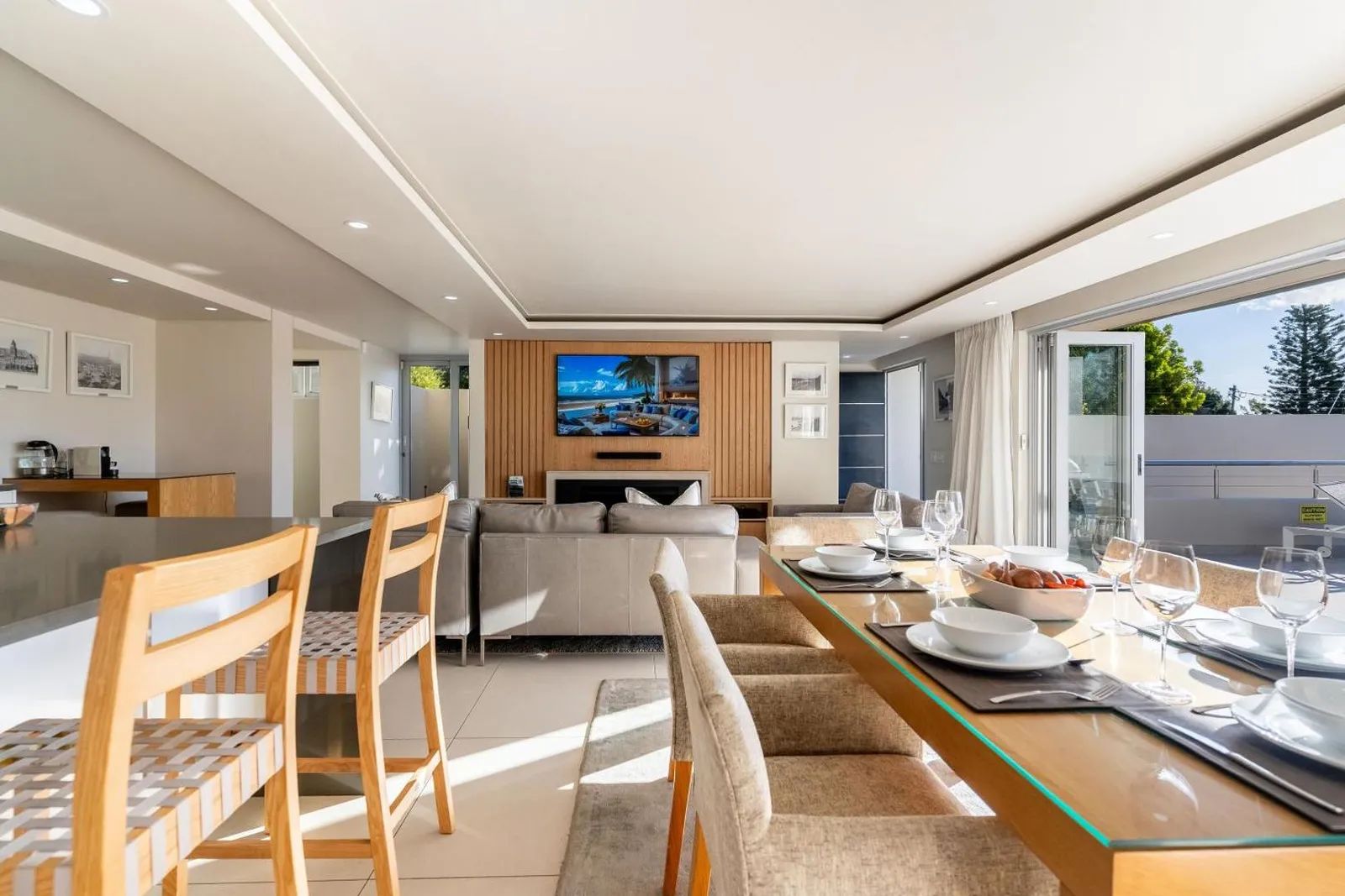 Open-plan dining and living with terrace access