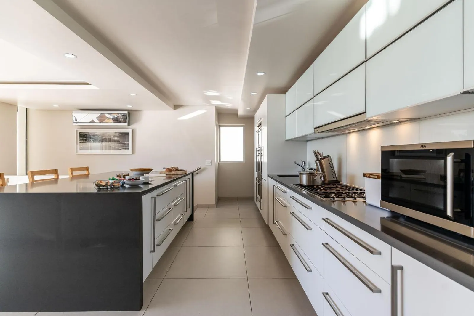 Galley kitchen with fitted appliances