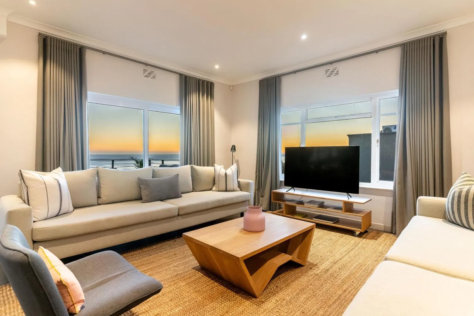 Living room with sea-facing windows and a low coffee table