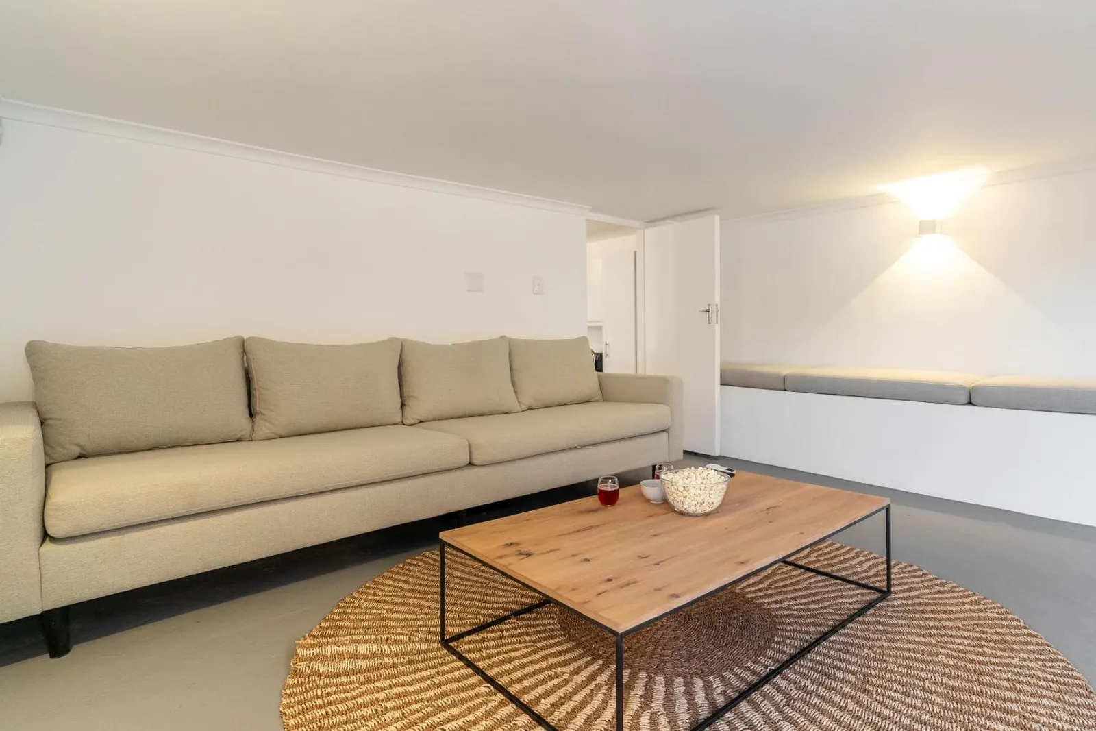 Lounge with a long sofa and window seat