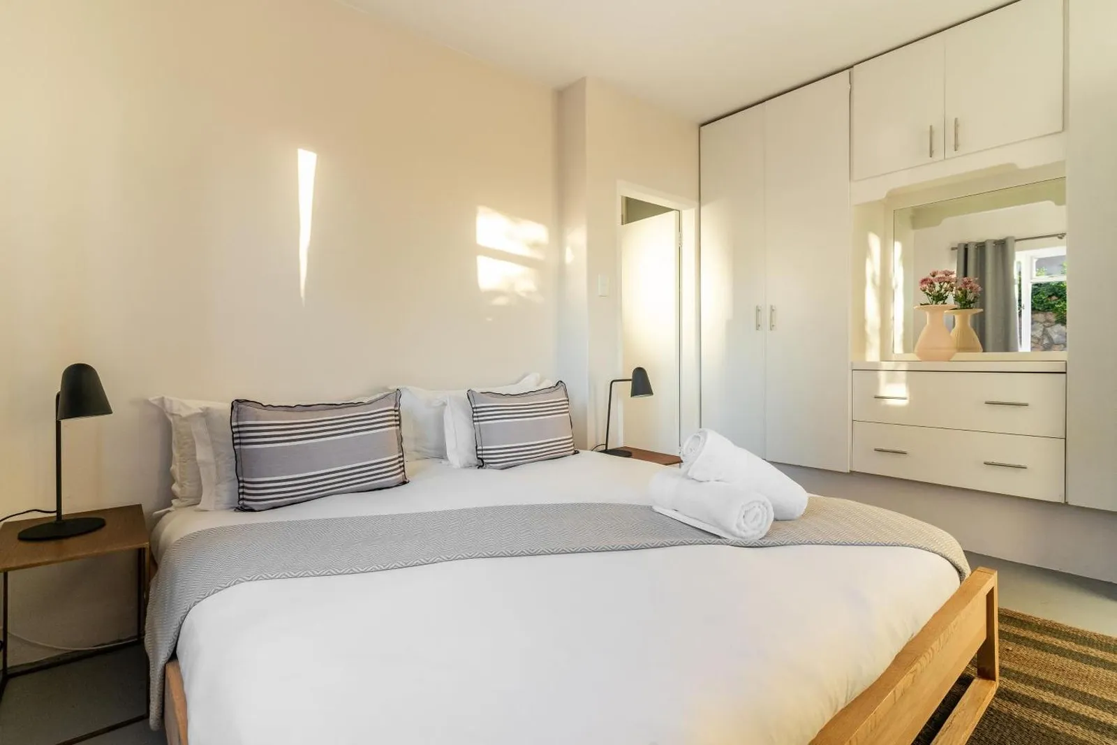 Bedroom with built-in wardrobes and a dressing table