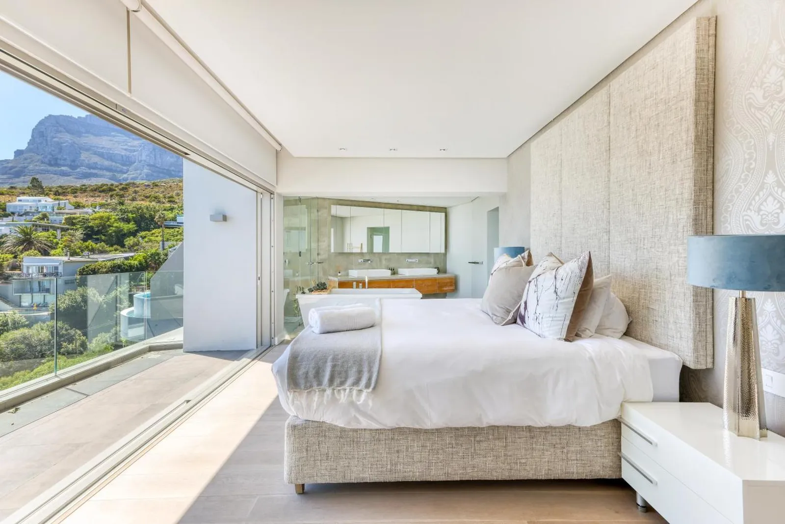 Main bedroom with a sea-facing balcony and en-suite