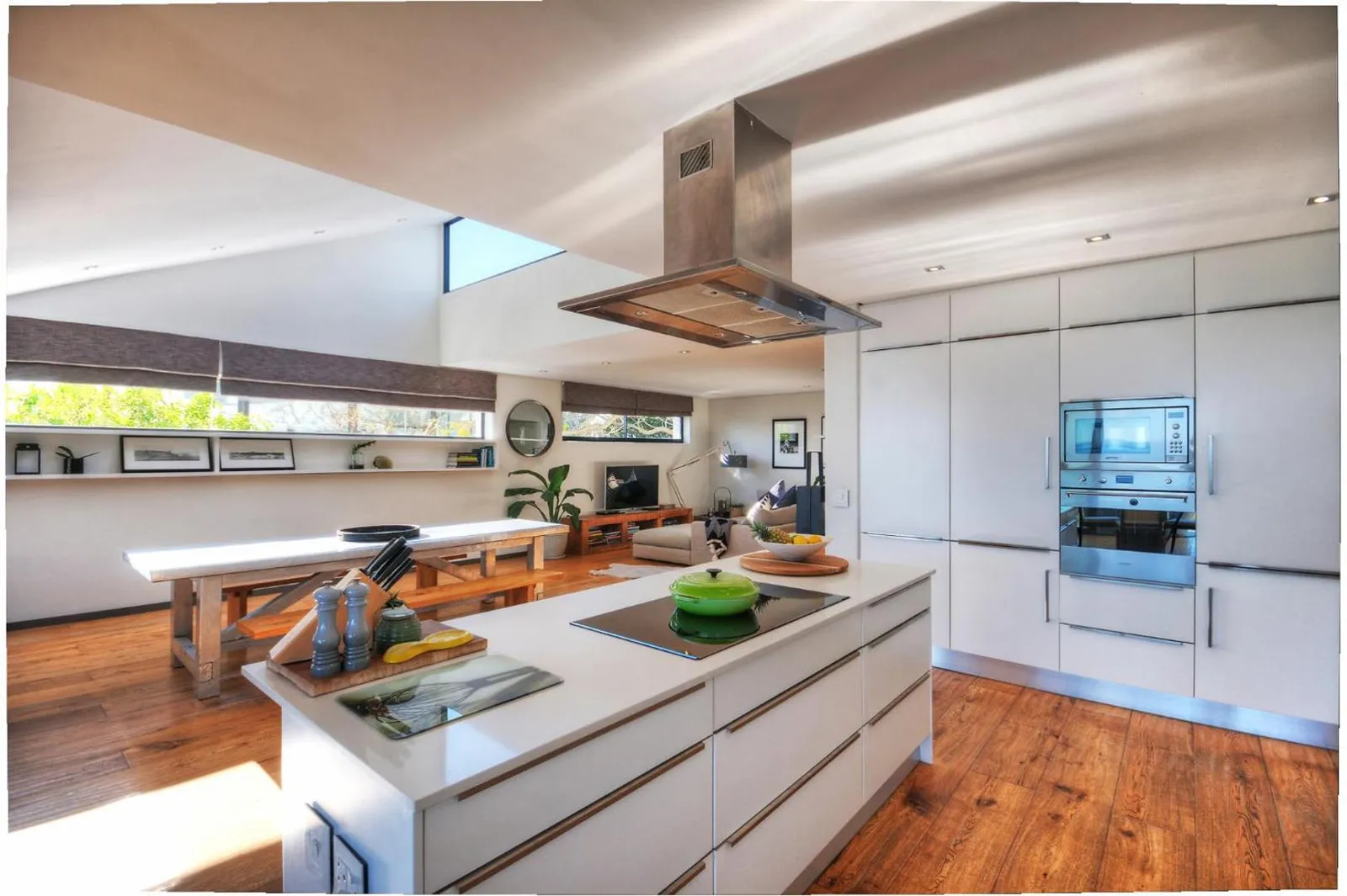 Kitchen island with pendant lighting and bar seating